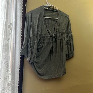 This is a grey blouse.